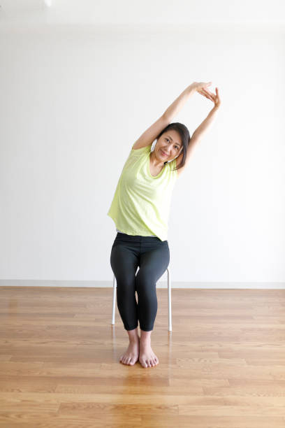3,600+ Chair Yoga Stock Photos, Pictures & Royalty-Free Images - iStock