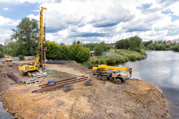 istock Construction of a bridge across the river 972054888