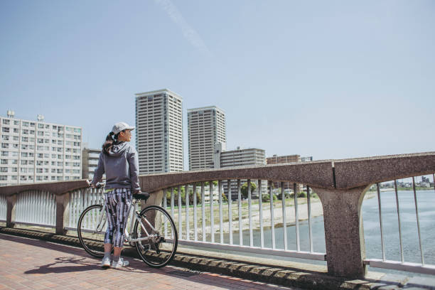 istock Asian women and cycling 972058360