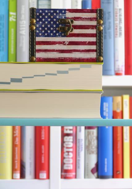 istock American flag  in front of a book shelf 972060812