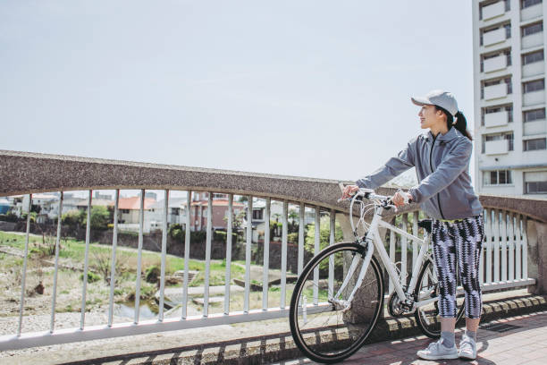 istock Asian women and cycling 972061070