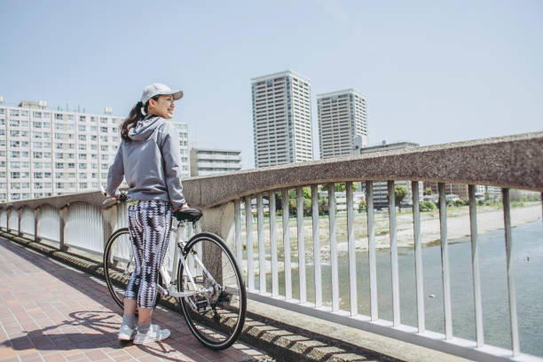 istock Asian women and cycling 972061486