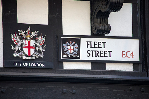 LONDON, UK - JUNE 6TH 2018: A street sign on Fleet Street in London, with the City of London crest, on 6th June 2018.