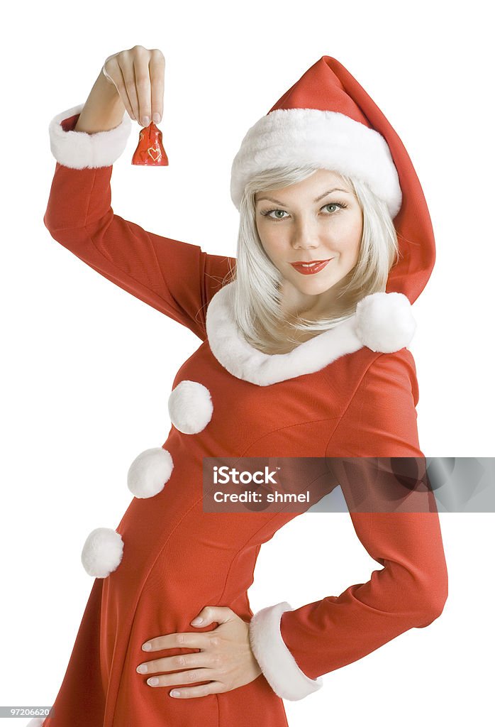 Donna Santa clausola che tiene una mano bell - Foto stock royalty-free di Abbigliamento