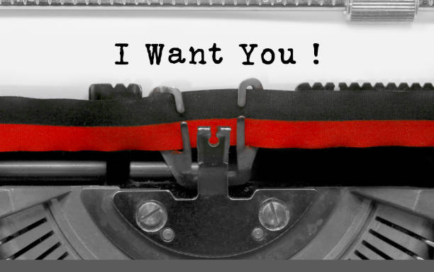 istock I Want You text by the old typewriter on white paper 972071398