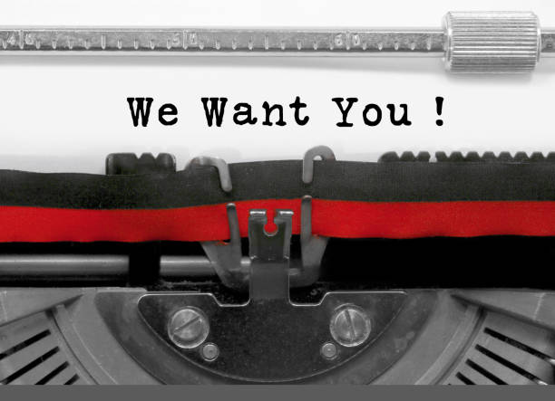istock We want you text by the old typewriter on white paper 972071906