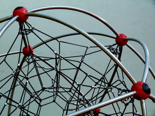 istock playground equipment with red ball joints 972074074