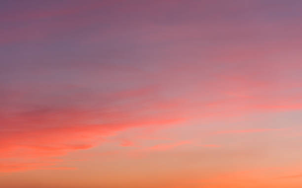 istock Beautiful bright sunset clouds in soft pastel tones. 972077522