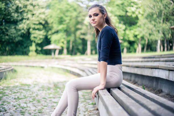 istock young woman relaxing in park 972086278