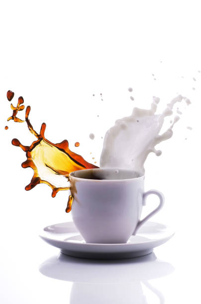 istock cup of coffee and milk with splash 972086460