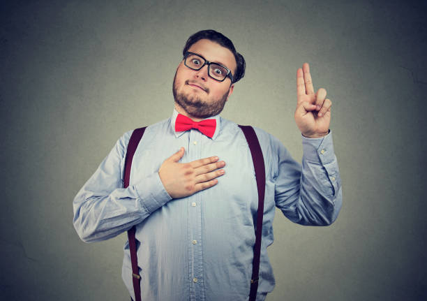 istock Funny man making promise expressively 972086600