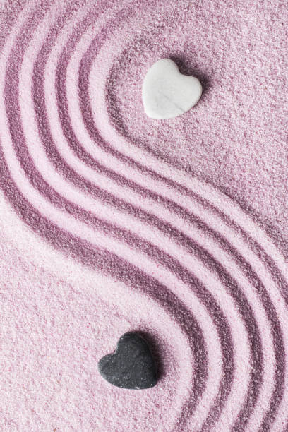 istock romantic zen garden with two stone hearts 972089486