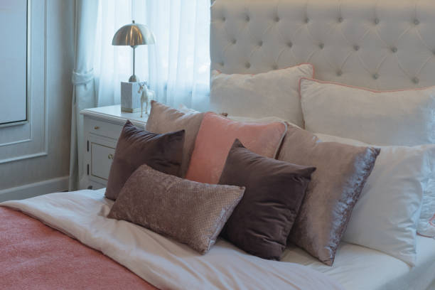 istock luxury bedroom with set of pillows 972101556