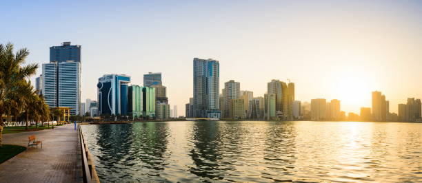 istock Panoramic view of Sharjah waterfront in UAE at sunset 972119160