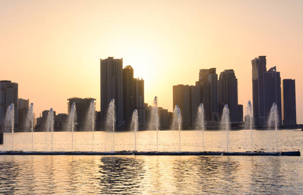 istock Panoramic view of Sharjah waterfront in UAE at sunset 972131624