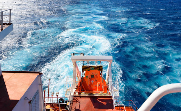 istock Trail behind ship at sea 972137890