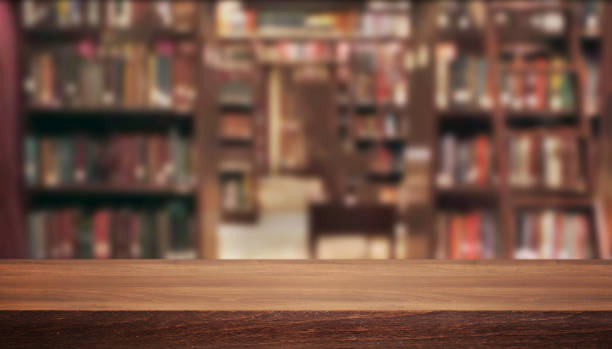 istock Wooden desk on interior background 972161680