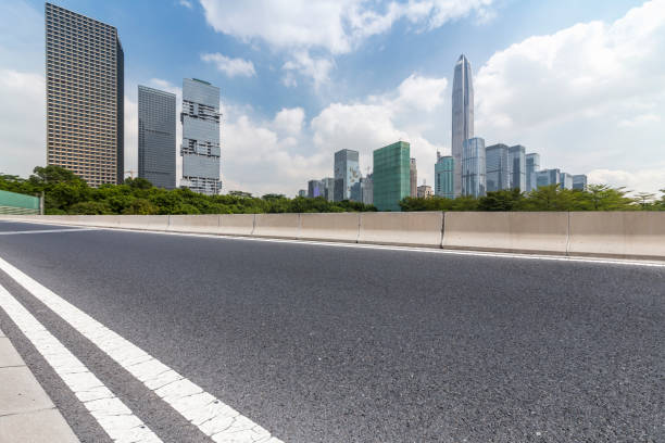 istock Panoramic skyline and modern business office buildings with empty road,empty concrete square floor 972161774