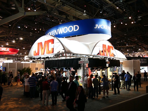 LAS VEGAS, NEVADA—APRIL 2017:  Crowds flock to the displays of the JVC booth at the National Association of Broadcasters or NAB annual trade show in Las Vegas.