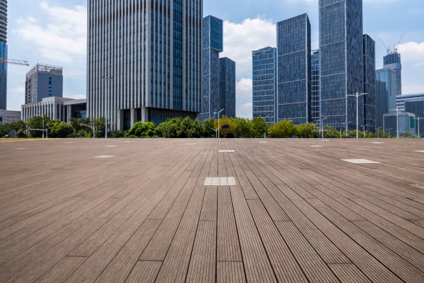 istock Panoramic skyline and modern business office buildings with empty road,empty concrete square floor 972170588