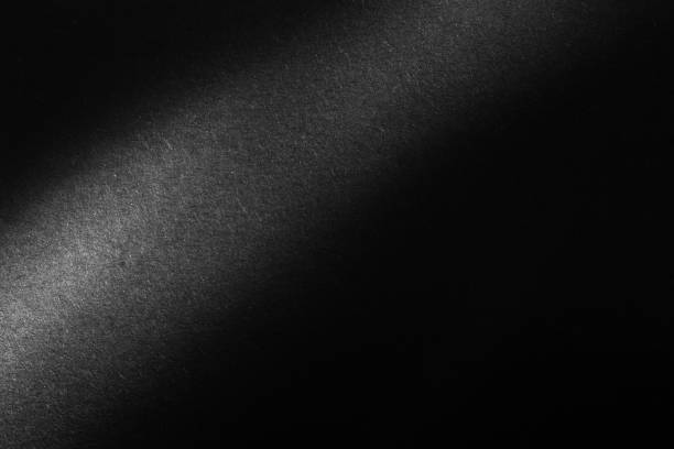istock black paper texture or background with spotlight, dark wall backdrop wallpaper, dark tone. 972176712