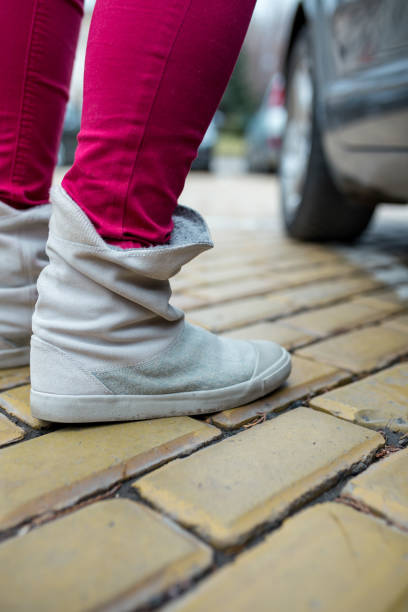 istock Girl standing on next to car, 972176778