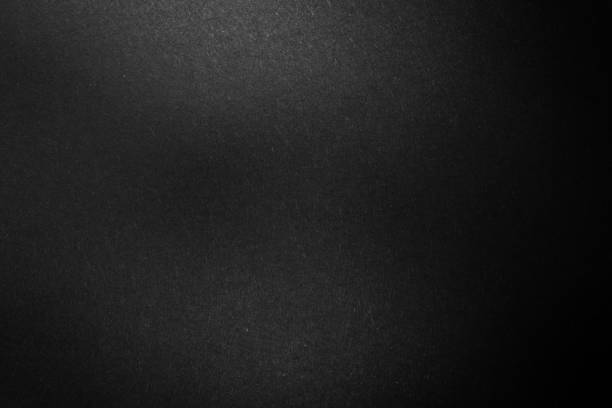 istock black paper texture or background with spotlight, dark wall backdrop wallpaper, dark tone. 972179312