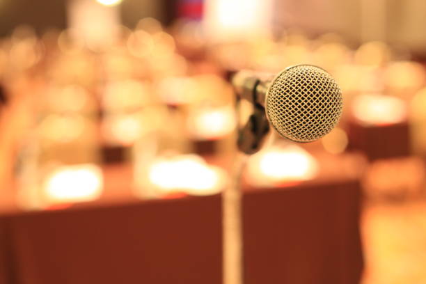 istock microphone in front of meeting room empty chairs before the conference 972179766