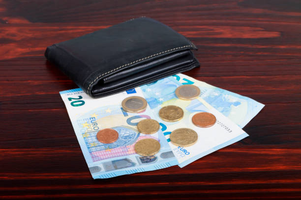 istock A wallet with coins and euro bills 972190976