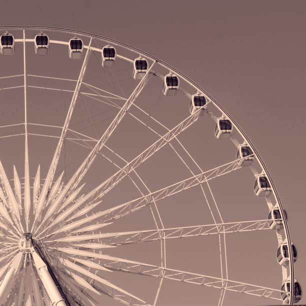 istock Beautiful large Ferris wheel. And the blue sky. 972193396