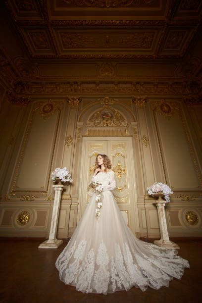 istock elegant stylish bride looking at rich interior in old building 972196498