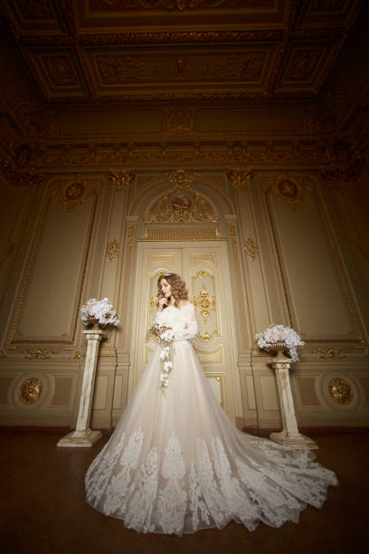 istock elegant stylish bride looking at rich interior in old building 972196510