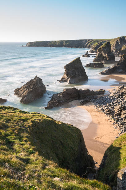 istock Stunning dusk sunset landscape image of Bedruthan Steps on West Cornwall coast in England 972197464