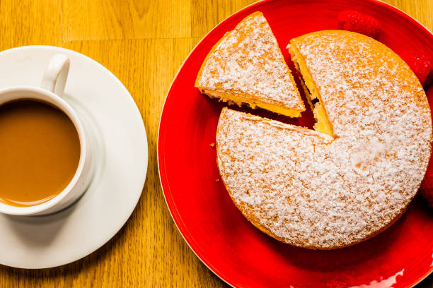 istock Cream Victoria sponge cake with raspberries 972197480