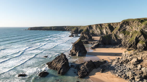 istock Stunning dusk sunset landscape image of Bedruthan Steps on West Cornwall coast in England 972200170