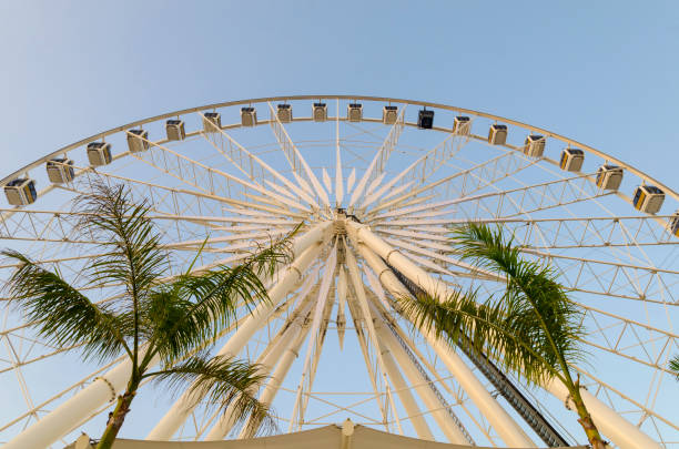 istock Beautiful large Ferris wheel. And the blue sky. 972200220