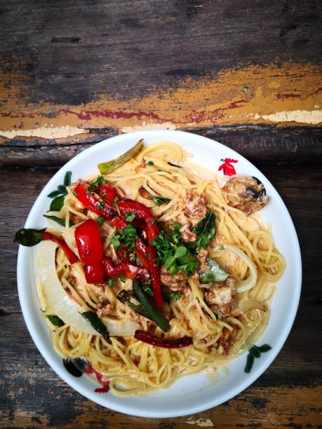 istock Top view of Spaghetti pasta with chicken meat on the table. 972202842