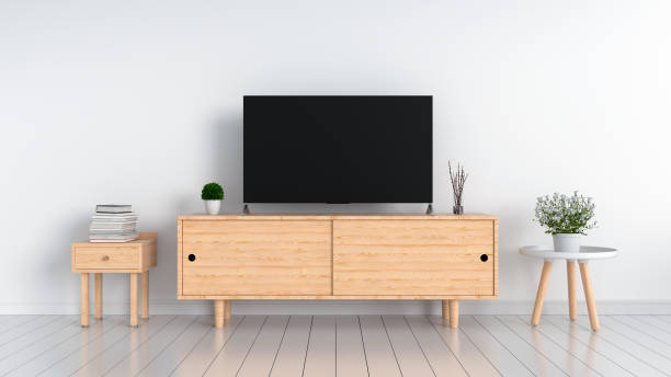 istock Widescreen TV in white living room, 3D rendering 972203224