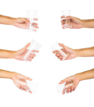 Collection of hand holding empty glass and transparent plastic cup like a pouring, begging water isolated on white background with clipping path. The difference between glass and plastic cup.