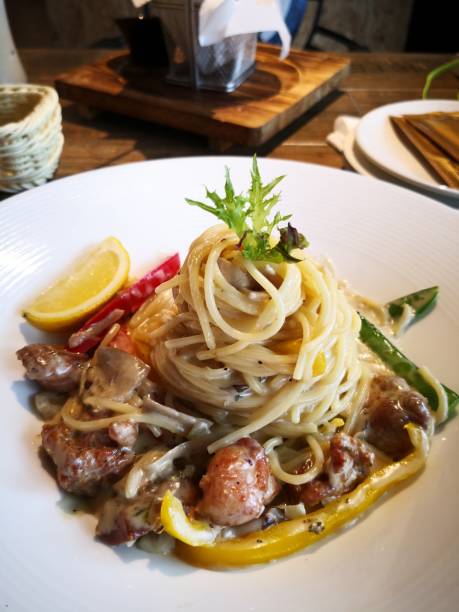 istock Spaghetti pasta with chicken on the table. 972213748