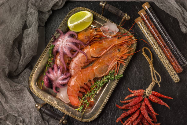 istock Fresh seafood shrimps octopus and squid 972213908