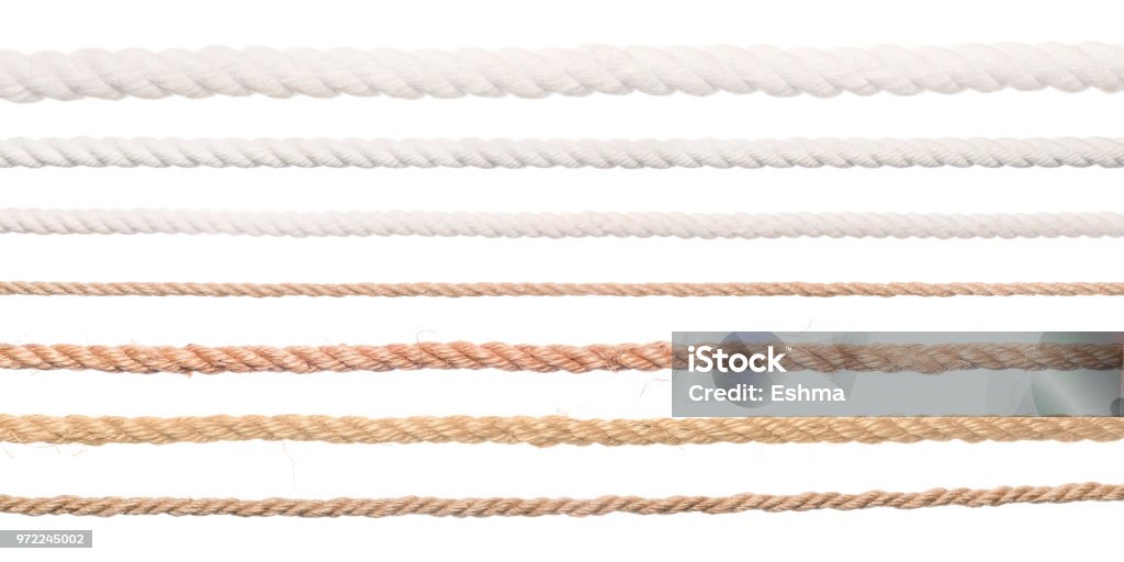 Long ropes collection isolated on white Ropes set. Collection of different straight long ropes isolated on white Rope Stock Photo