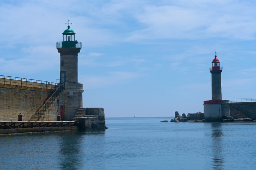 Two lighthouses of a harbor seen from the seasight