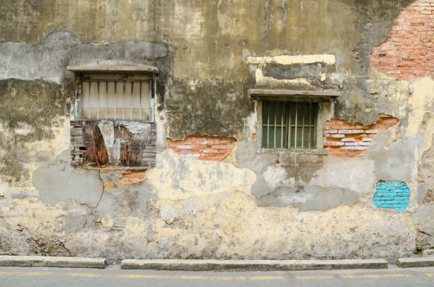 istock Front wall of old tenement house. 972301110