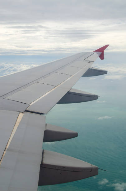 istock View from a jet plane window high on the blue skies 972301326