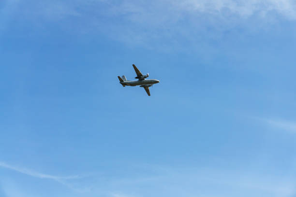 istock In a clear blue sky, a small plane with screw engines 972310374