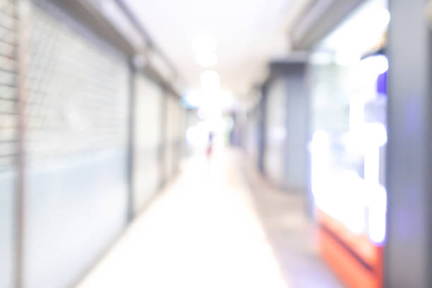 istock shopping mall abstract defocused blurred background 972316058
