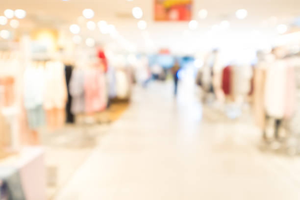 istock shopping mall abstract defocused blurred background 972316074