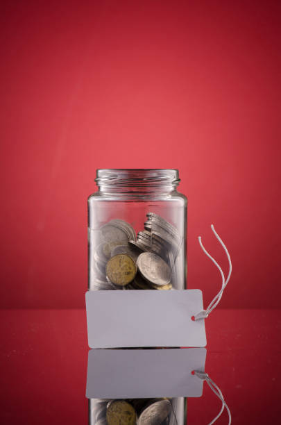 istock coin in transparent glass jar 972318420