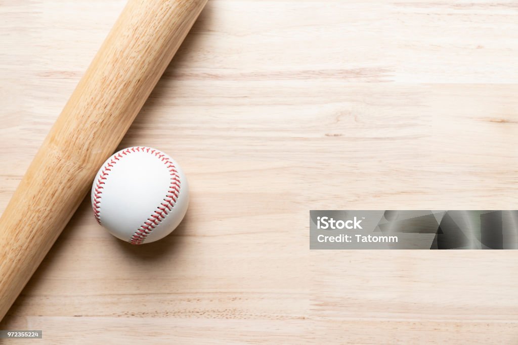 baseball and baseball bat on wooden table background, close up Baseball - Ball Stock Photo